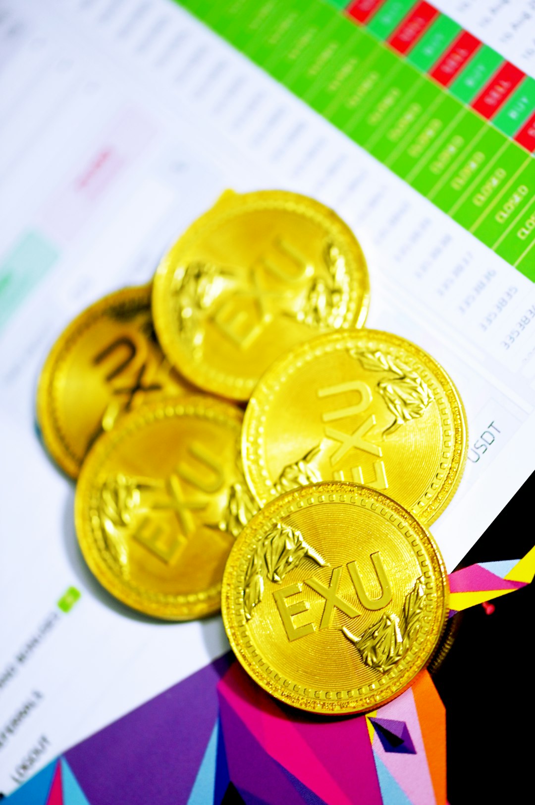 A pile of Executium coins on top of a trading site